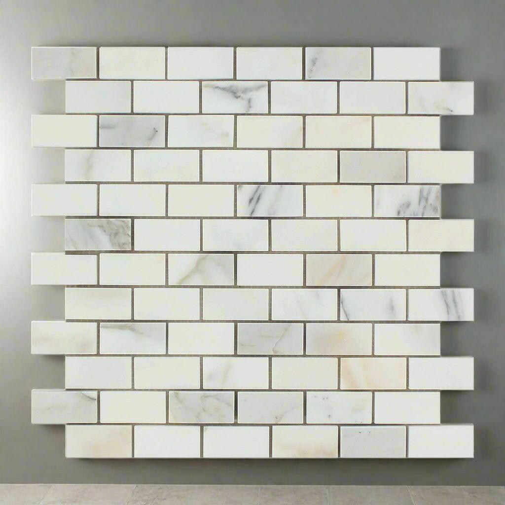 1x2 Calacatta Gold Marble Polished Brick Mosaic Tile 1x2 Calacatta Gold Marble Polished Brick Mosaic Tile - American Tile Depot