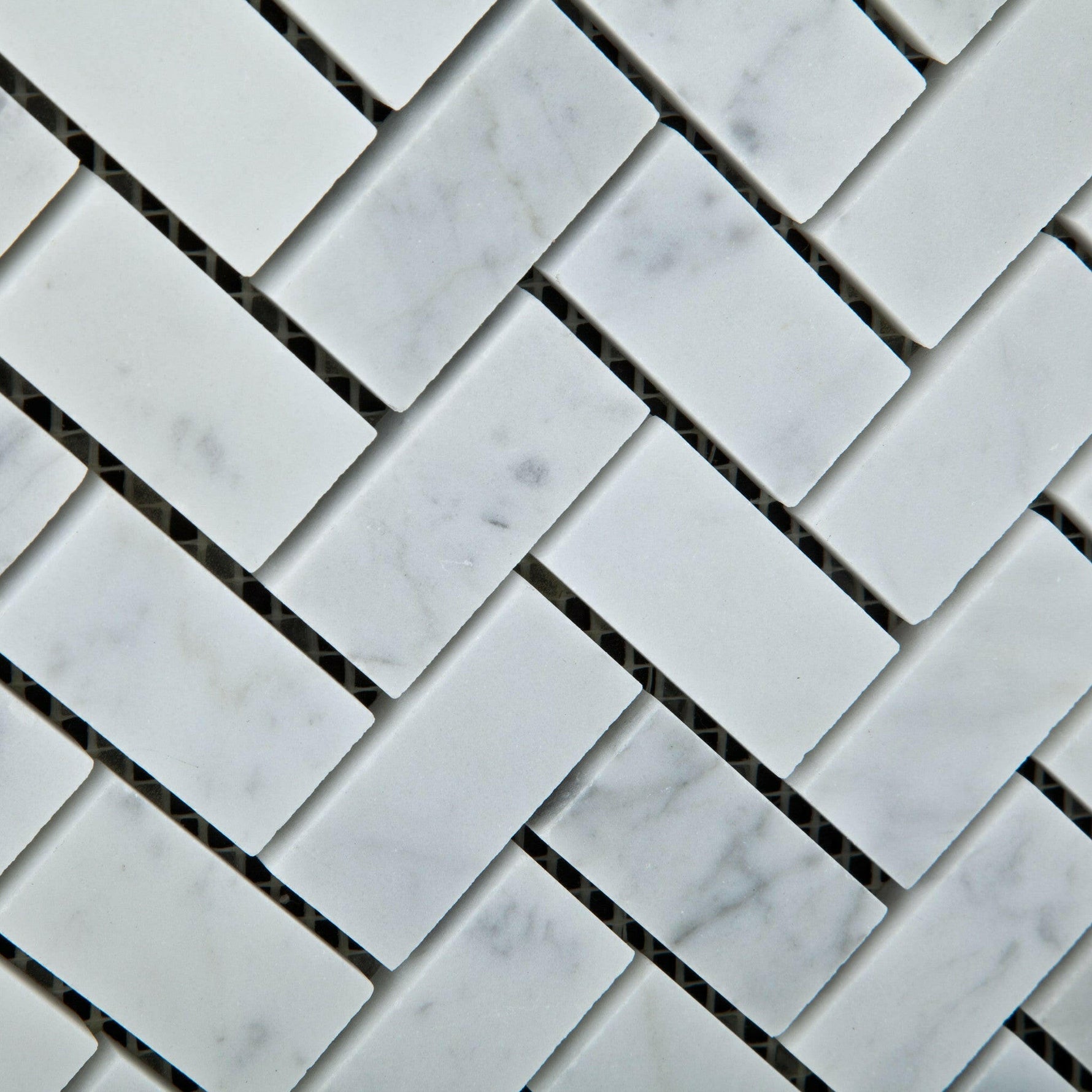 1x2 Carrara White Marble Polished Herringbone Mosaic Tile 1x2 Carrara White Marble Polished Herringbone Mosaic Tile - American Tile Depot